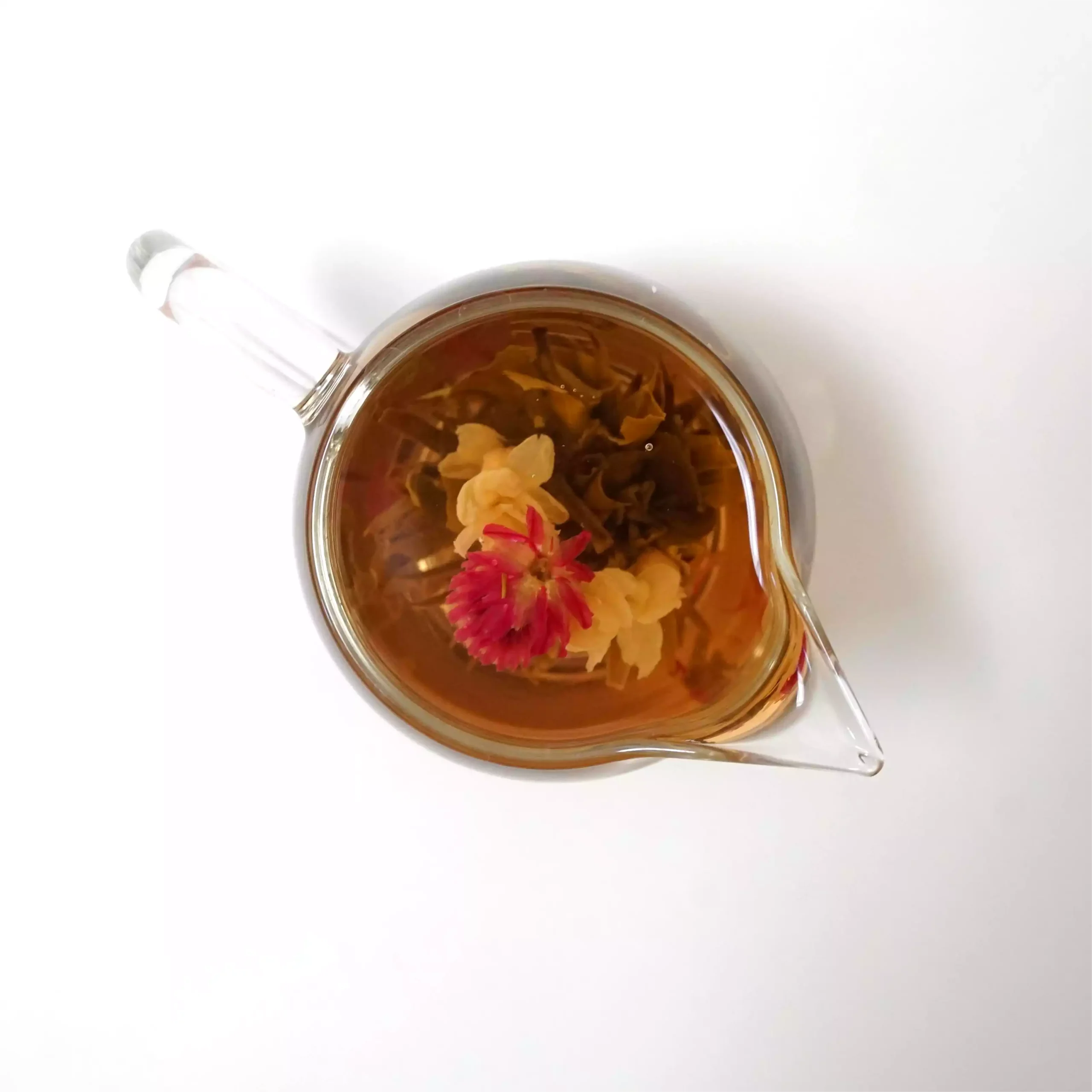 Ruby Tiara blooming tea, opened in the cup