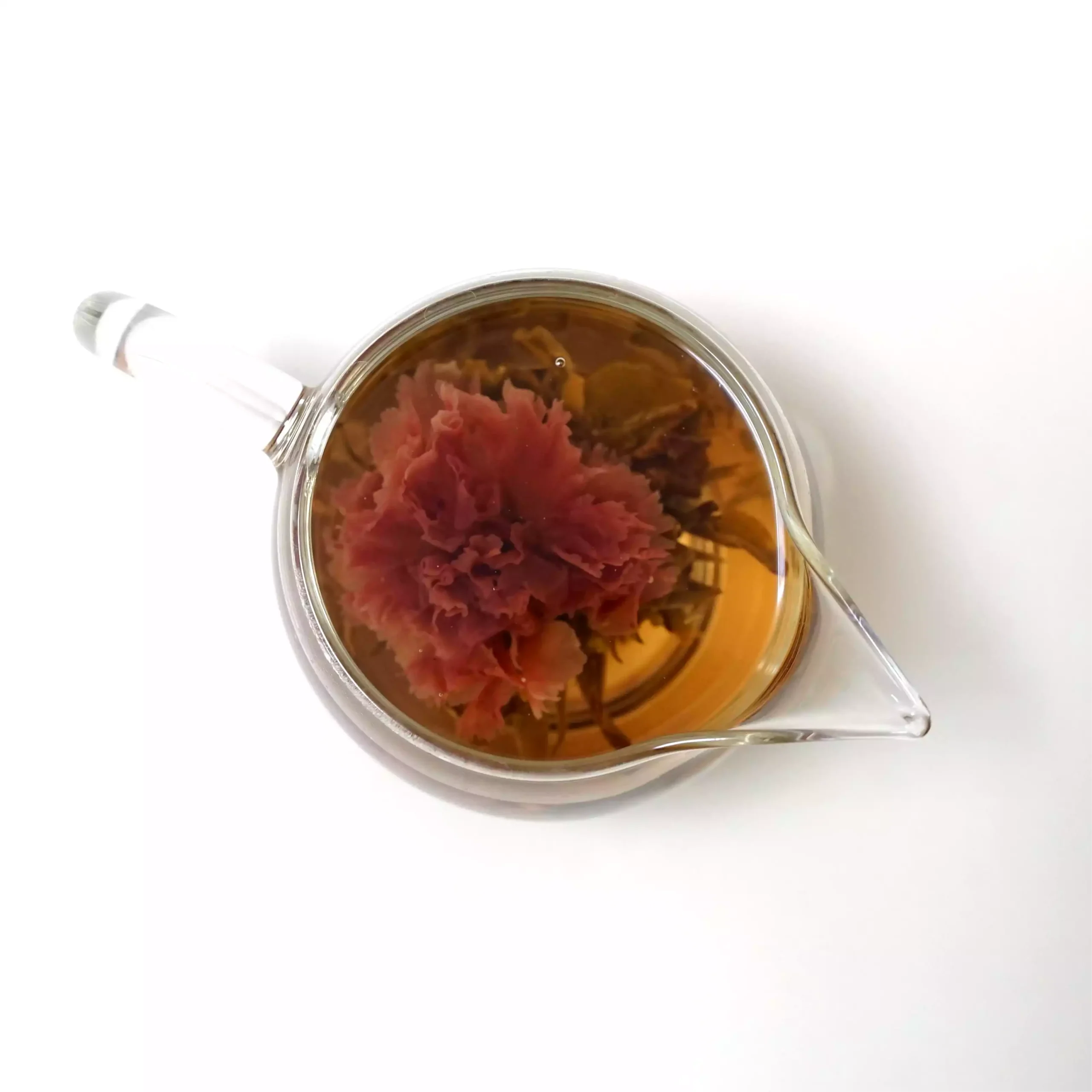 Oxblood blooming tea, opened in the cup